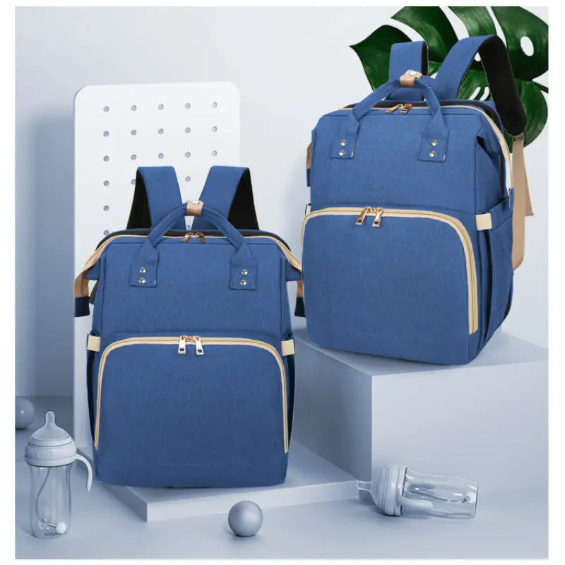 Nuovo - 2 in 1 Babypack with Fold Out Bed - Blue